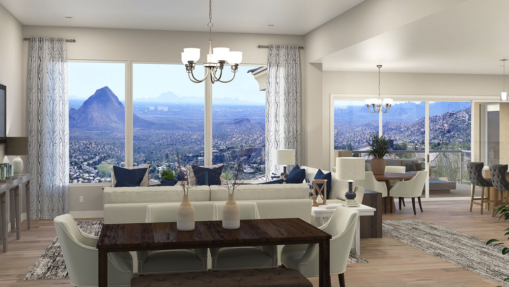 View of desert valley from living room of a home on a hill