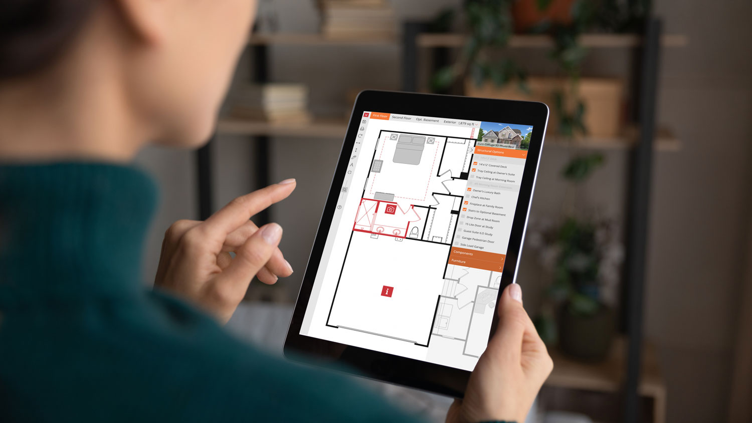 Woman using Interactive Floor Plans on a tablet