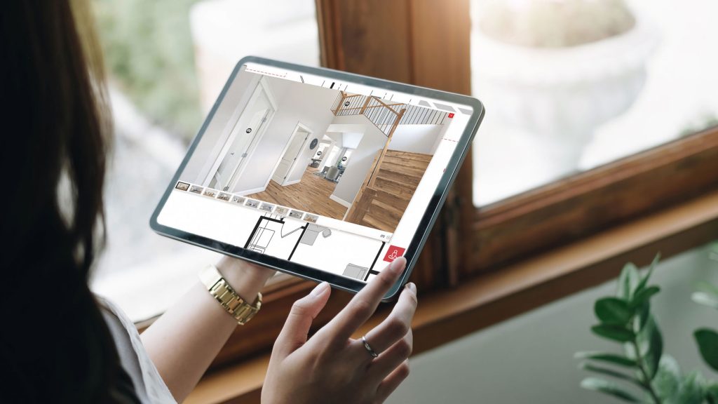Interactive Floor Plans - woman holding a tablet with an interactive floor plan