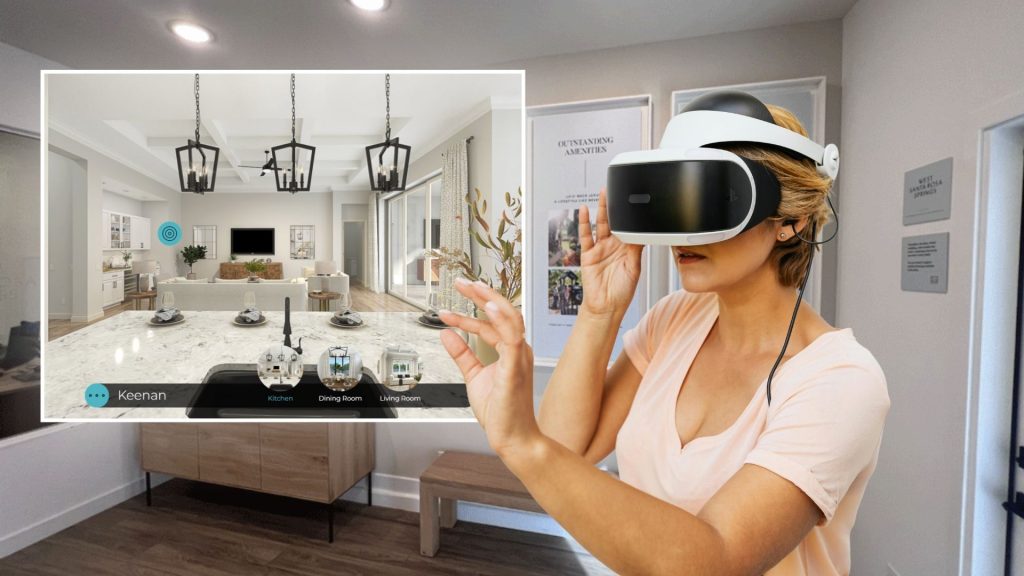 Person wearing a white VR headset and hand controllers, with arms raised as they interact with a virtual Tour.